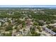 High-angle shot of homes, streets, and green spaces in a quiet residential area at 3600 Magnolia Ridge Cir # 1221-G, Palm Harbor, FL 34684