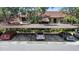 Convenient covered carport with ample parking space and well-maintained landscaping at 3600 Magnolia Ridge Cir # 1221-G, Palm Harbor, FL 34684