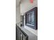 Outdoor hallway offering natural light and a sense of the outdoors at 3600 Magnolia Ridge Cir # 1221-G, Palm Harbor, FL 34684