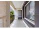 Outdoor porch with views of surrounding foliage and an inviting ambiance at 3600 Magnolia Ridge Cir # 1221-G, Palm Harbor, FL 34684