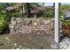 Community signage in a stone surround with Magnolia Ridge I posted on the sign at 3600 Magnolia Ridge Cir # 1221-G, Palm Harbor, FL 34684