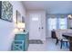 Inviting foyer with stylish decor and a view into the dining area at 3765 Maxwell Park Dr, Sun City Center, FL 33573