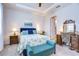 Bedroom with ceiling fan, natural light, and a desk with vanity at 3765 Maxwell Park Dr, Sun City Center, FL 33573