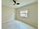 Cozy bedroom with tile flooring and a window for natural light at 3944 102Nd N Pl, Clearwater, FL 33762