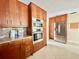 Updated kitchen with stainless steel appliances, granite countertops and tiled backsplash at 3944 102Nd N Pl, Clearwater, FL 33762