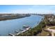 Picturesque aerial view of the waterfront with boats docked along the river at 399 C 2Nd St # 313, Indian Rocks Beach, FL 33785