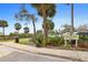 The Indian Rocks Beach Keegan Clair Park features palm trees, lush greenery, and scenic views under a bright blue sky at 399 C 2Nd St # 313, Indian Rocks Beach, FL 33785