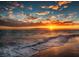 Beautiful ocean sunset with colorful clouds reflecting on the water's surface at 399 2Nd St # 313, Indian Rocks Beach, FL 33785