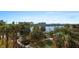 Scenic water view featuring palm trees, walking docks, and waterfront condos at 399 C 2Nd St # 313, Indian Rocks Beach, FL 33785