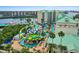 Resort waterpark featuring a large waterslide, pools, and lush landscaping for Gathering fun at 399 C 2Nd St # 313, Indian Rocks Beach, FL 33785