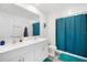 Bright bathroom showcasing a double vanity, large mirror, and modern fixtures, with a tub/shower combo at 4025 Capri Coast Dr, Plant City, FL 33565