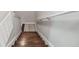 Downstairs staircase with wooden steps at 4183 Ballantrae Blvd, Land O Lakes, FL 34638