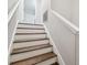 Upstairs staircase with wooden steps at 4183 Ballantrae Blvd, Land O Lakes, FL 34638