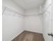 This walk-in closet has carpeted flooring and wire shelving for optimal storage space at 4183 Ballantrae Blvd, Land O Lakes, FL 34638