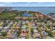 Scenic aerial view of the property with stunning waterfront views in the distance at 4340 50Th S Ter, St Petersburg, FL 33711