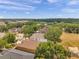 Aerial view showcasing community amenities, including sports field and shaded area at 4500 Fieldview Cir, Wesley Chapel, FL 33545