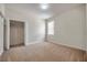 Bedroom with natural light from the window and large closet with shelving at 4500 Fieldview Cir, Wesley Chapel, FL 33545