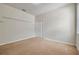 This bedroom features carpet, a neutral color scheme, and a closet at 4500 Fieldview Cir, Wesley Chapel, FL 33545