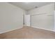 This bedroom includes a walk in closet, a window and carpet at 4500 Fieldview Cir, Wesley Chapel, FL 33545