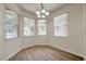 Breakfast nook with lots of natural light, laminate floors, and bright trim at 4500 Fieldview Cir, Wesley Chapel, FL 33545