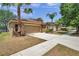 Lovely single Gathering home with a spacious driveway and a beautiful landscaped yard at 4500 Fieldview Cir, Wesley Chapel, FL 33545