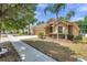 Well-maintained single Gathering home with landscaped yard, and a two-car garage at 4500 Fieldview Cir, Wesley Chapel, FL 33545