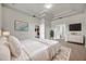 Spacious main bedroom showcasing trey ceiling, carpet, and bright natural light at 4500 Fieldview Cir, Wesley Chapel, FL 33545