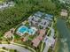 The Estancia community features a resort-style pool, tennis courts, playground, and a beautiful surrounding landscape at 4719 Tramanto Ln, Wesley Chapel, FL 33543
