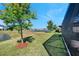 Expansive backyard view of a lake, showcasing the property's serene outdoor space at 4719 Tramanto Ln, Wesley Chapel, FL 33543