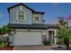 Charming two-story home with a brick driveway and manicured landscaping at 4719 Tramanto Ln, Wesley Chapel, FL 33543