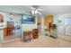Open kitchen layout with casual dining area, tile floors, and seamless flow to living spaces at 4932 Murray Hill Dr, Tampa, FL 33615