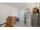 Room featuring filing cabinets and a doorway to another room at 4932 Murray Hill Dr, Tampa, FL 33615
