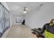 Spacious room with tile floors and a ceiling fan at 4932 Murray Hill Dr, Tampa, FL 33615