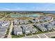 Aerial view of a new residential community with a lagoon and waterfront at 5917 Cat Claw Ln, Bradenton, FL 34210