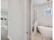 Modern bathroom featuring a soaking tub, walk-in shower, and bright natural light at 5917 Cat Claw Ln, Bradenton, FL 34210