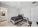 Comfortable bedroom features a single bed with grey bedding and a stylish accent rug at 5917 Cat Claw Ln, Bradenton, FL 34210