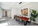 Open floor plan with dining table, decorative lighting, and decorative art at 5917 Cat Claw Ln, Bradenton, FL 34210