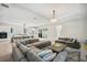 Open-concept living space with combined living room and kitchen areas at 5917 Cat Claw Ln, Bradenton, FL 34210
