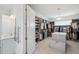 Spacious walk-in closet with custom shelving, hanging rods, and ample storage space at 5917 Cat Claw Ln, Bradenton, FL 34210