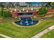 Landscaped water feature at 'The Reserve' entrance, boasting manicured greenery and a serene ambiance at 6352 W Maclaurin Dr, Tampa, FL 33647