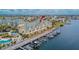 Waterfront condo complex with boat docks and a community pool at 6414 Sunset Bay Cir, Apollo Beach, FL 33572