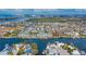 Aerial view of the waterfront condo community, boat docks, and surrounding neighborhood at 6414 Sunset Bay Cir, Apollo Beach, FL 33572