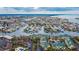 Aerial view of the waterfront townhome community, pools and surrounding waterways at 6414 Sunset Bay Cir, Apollo Beach, FL 33572