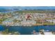 Breathtaking waterfront community showcasing private docks, sparkling pool, and picturesque surroundings, offering serene coastal living at 6414 Sunset Bay Cir, Apollo Beach, FL 33572