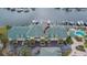 Aerial view of townhome complex with boat slips and a pool at 6414 Sunset Bay Cir, Apollo Beach, FL 33572