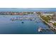 Busy marina with many boats docked and waterfront homes in the background at 6414 Sunset Bay Cir, Apollo Beach, FL 33572