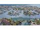 Aerial view of the harbor townhomes surrounded by the beautiful waterfront community at 6414 Sunset Bay Cir, Apollo Beach, FL 33572