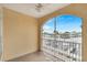 A tiled balcony overlooking a canal and docks with views of the water and neighborhood at 6414 Sunset Bay Cir, Apollo Beach, FL 33572