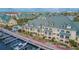 Waterfront condos with a boat dock, pool, and beautiful landscaping offer luxury living with all the amenities at 6414 Sunset Bay Cir, Apollo Beach, FL 33572