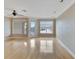 Spacious living room with hardwood floors and waterfront view at 6414 Sunset Bay Cir, Apollo Beach, FL 33572
